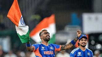 India's Hardik Pandya (L) and his teammate Ishan Kishan celebrate after their team's win in the 2026 ICC Men's T20 Cricket World Cup final match against New Zealand at the Narendra Modi Stadium in Ahmedabad on March 8, 2026. 
Punit PARANJPE / AFP