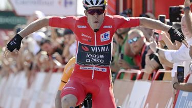 Overall ranking leader Team Visma's Wout van Aert celebrates as he crosses the finish, winning the stage 3 of La Vuelta a Espana cycling tour, a 191.2 km race between Lousa and Castelo Branco, on August 19, 2024.  
MIGUEL RIOPA / AFP