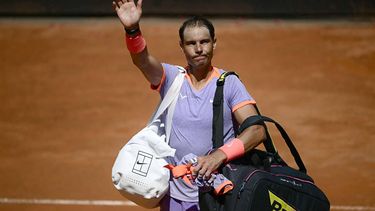Spain's Rafael Nadal greets fans as he leaves the field after being defeated by Poland's Hubert Hurkacz during the Men's ATP Rome Open tennis tournament at Foro Italico in Rome on May 11, 2024.  
Filippo MONTEFORTE / AFP