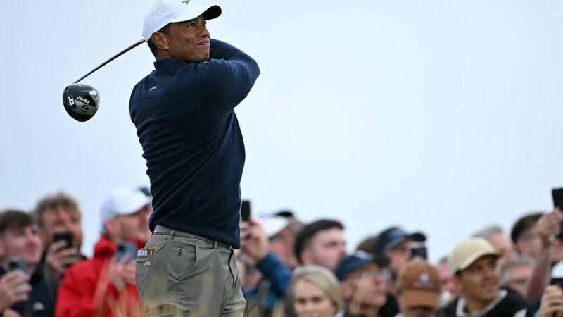 (FILES) US golfer Tiger Woods watches his drive from the 4th tee during his second round, on day two of the 152nd British Open Golf Championship at Royal Troon on the south west coast of Scotland on July 19, 2024. Golf superstar Tiger Woods was involved in a car crash in Florida on March 27, 2026, US media reports citing local law enforcement said. There was no immediate word on Woods' condition following the incident in Jupiter Island, ABC television reported. NBC local news affiliate WPTV showed a picture of the crash scene showing a sports utility vehicle flipped onto its side.

Paul ELLIS / AFP